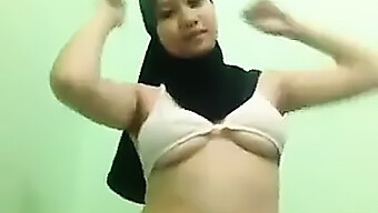 An Attractive Indonesian Girl Undressing For Me